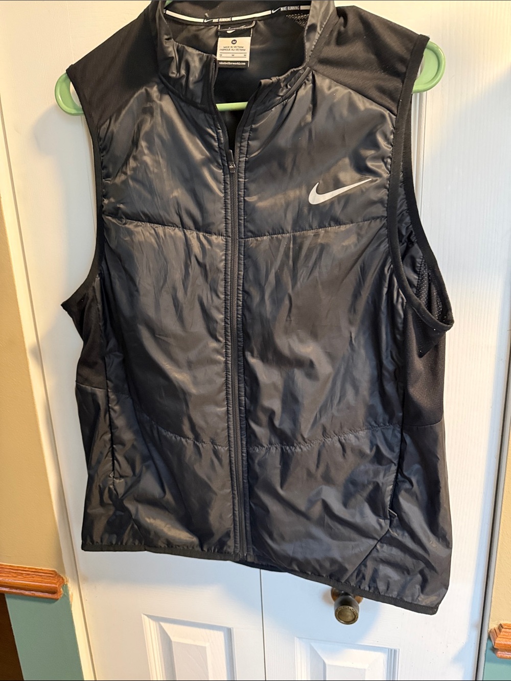 Nike Black Sleeveless Puffer Vest with Reflective Swoosh
